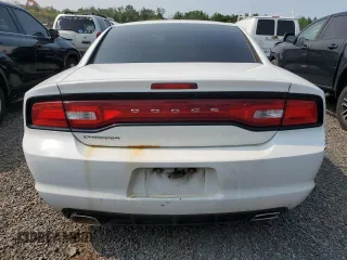 2013 Dodge Charger SE z VIN 2C3CDXBG4DH639122, wystawiony jako Copart lot #59042345 z przebiegiem 150 277 mil mil oraz Szkoda całkowita • Salvage title. Historia ofert i sprzedaży dostępna na DreamBid. Obrazek 6.