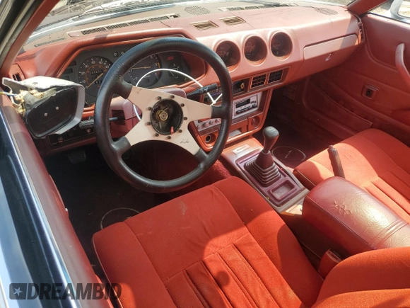 1981 Datsun 280ZX z VIN JN1HZ04S5BX279396, wystawiony jako Copart lot #60198965 z przebiegiem 85 526 mil mil oraz Szkoda całkowita • Salvage title. Historia ofert i sprzedaży dostępna na DreamBid. Obrazek 8.