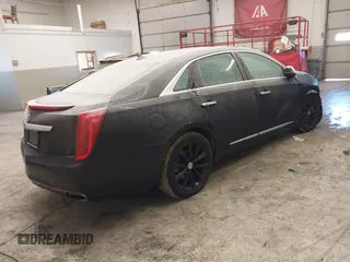 2013 Cadillac XTS Luxury with VIN 2G61P5S34D9200849, listed as a IAAI auction lot 41412189 with 134,932 mi miles. Bid and sale history available at carsss.com. Image 4.