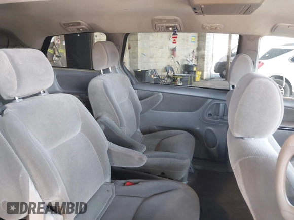 2005 Toyota Sienna LE with VIN 5TDBA23C75S046310, listed as a IAAI auction lot 42063973 with 127,509 mi miles. Bid and sale history available at carsss.com. Image 8.