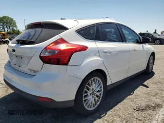 2014 Ford Focus Titanium with VIN 1FADP3N21EL264509, listed as a Copart auction lot 59544475 with 154,142 mi miles and Clean title. Bid and sale history available at DreamBid. Image 3.