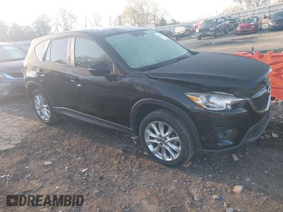 2015 Mazda CX-5 Grand Touring with VIN JM3KE4DY6F0513173, listed as a IAAI auction lot 41867030 with 93,770 mi miles. Bid and sale history available at carsss.com. Image 1.
