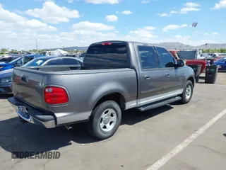 2002 Ford F-150 XLT with VIN 1FTRW07L22KB41794, listed as a IAAI auction lot 42072478 with 116,252 mi miles and . Bid and sale history available at DreamBid. Image 4.