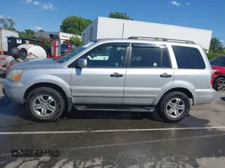 2005 Honda Pilot EX-L z VIN 5FNYF18555B023872, wystawiony jako IAAI lot #42330280 z przebiegiem 143 589 mil mil oraz . Historia ofert i sprzedaży dostępna na DreamBid. Obrazek 14.