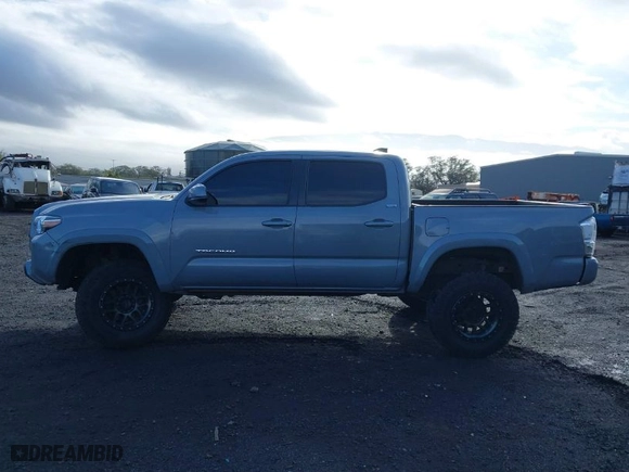 2020 Toyota Tacoma 4WD SR5 with VIN 3TMCZ5AN7LM366243, listed as a IAAI auction lot 41399117 with 58,126 mi miles. Bid and sale history available at carsss.com. Image 14.