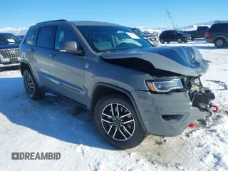 2021 Jeep Grand Cherokee Trailhawk with VIN 1C4RJFLG2MC854007, listed as a IAAI auction lot 41512394 with 50,674 mi miles. Bid and sale history available at carsss.com. Image 1.