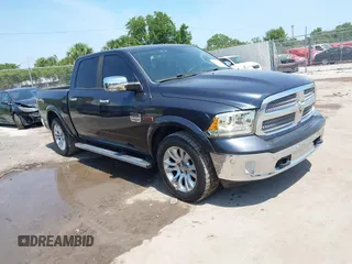 2014 Ram 1500 Longhorn with VIN 1C6RR7PM7ES371805, listed as a IAAI auction lot 42345129 with 168,232 mi miles and . Bid and sale history available at DreamBid. Image 1.