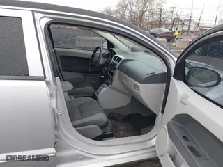 2007 Dodge Caliber SXT with VIN 1B3HB48BX7D379555, listed as a IAAI auction lot 42022554 with 99,670 mi miles. Bid and sale history available at carsss.com. Image 5.