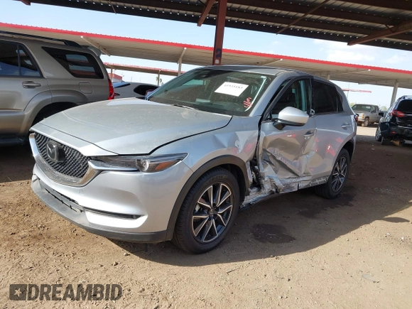 2017 Mazda CX-5 Grand Touring with VIN JM3KFADL3H0121772, listed as a IAAI auction lot 41935183 with 48,869 mi miles and . Bid and sale history available at carsss.com. Image 6.