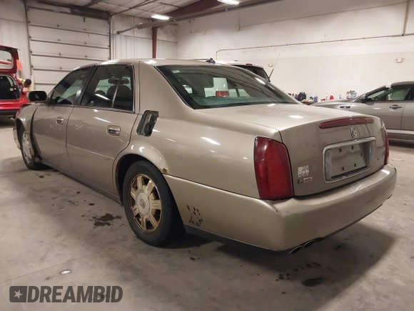 2004 Cadillac DeVille z VIN 1G6KD54Y04U119341, wystawiony jako IAAI lot #42193664 z przebiegiem 162 290 mil mil oraz . Historia ofert i sprzedaży dostępna na DreamBid. Obrazek 3.