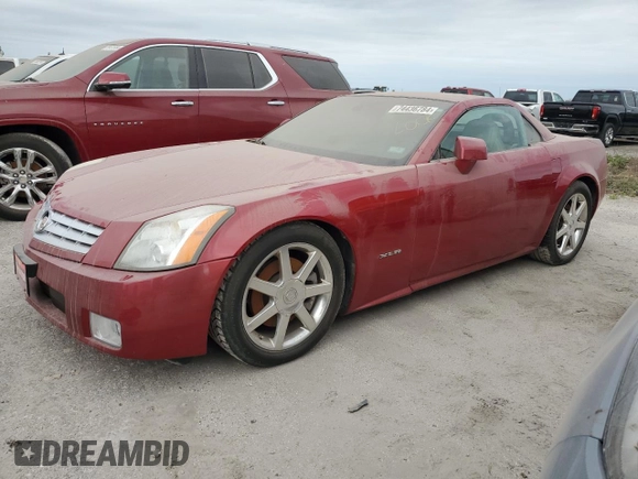 2005 Cadillac XLR z VIN 1G6YV34A855601016, wystawiony jako Copart lot #74436784 z przebiegiem Nie podano mil oraz Szkody całkowita. Historia ofert i sprzedaży dostępna na DreamBid. Obrazek 1.