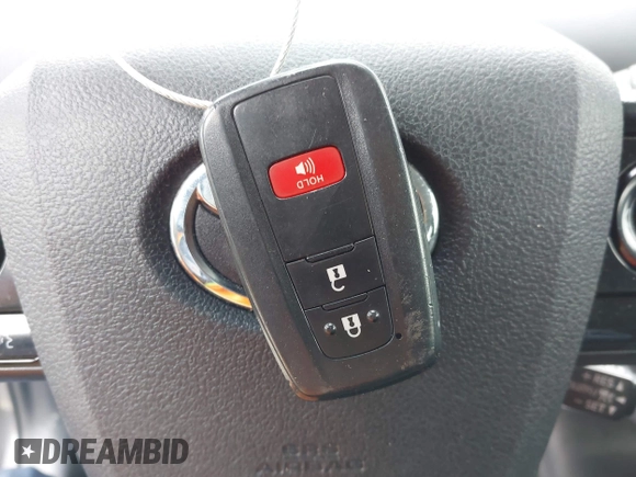 2022 Toyota Prius L Eco with VIN JTDKAMFU4N3183352, listed as a IAAI auction lot 42170623 with 52,244 mi miles and . Bid and sale history available at DreamBid. Image 11.