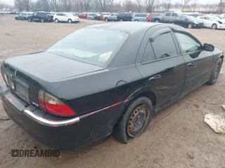 2003 Lincoln LS Sport with VIN 1LNHM87A73Y691310, listed as a IAAI auction lot 41210319 with 1 mi miles. Bid and sale history available at carsss.com. Image 4.