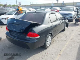 2006 Mitsubishi Lancer ES with VIN JA3AJ26EX6U059654, listed as a IAAI auction lot 41817577 with 180,177 mi miles. Bid and sale history available at carsss.com. Image 4.