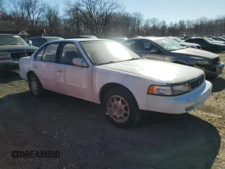 1994 Nissan Maxima z VIN JN1HJ01F0RT230431, wystawiony jako Copart lot #50020135 z przebiegiem 116 846 mil mil oraz Szkody całkowita. Historia ofert i sprzedaży dostępna na DreamBid. Obrazek 4.