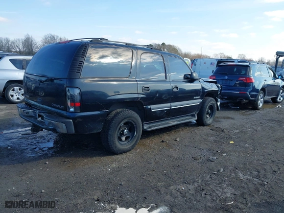 2002 Chevrolet Tahoe LT with VIN 1GNEC13Z02R203361, listed as a IAAI auction lot 41580885 with 349,050 mi miles. Bid and sale history available at carsss.com. Image 4.