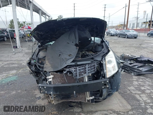 2015 Cadillac SRX with VIN 3GYFNAE36FS573940, listed as a IAAI auction lot 41808779 with Not Provided miles and . Bid and sale history available at DreamBid. Image 6.
