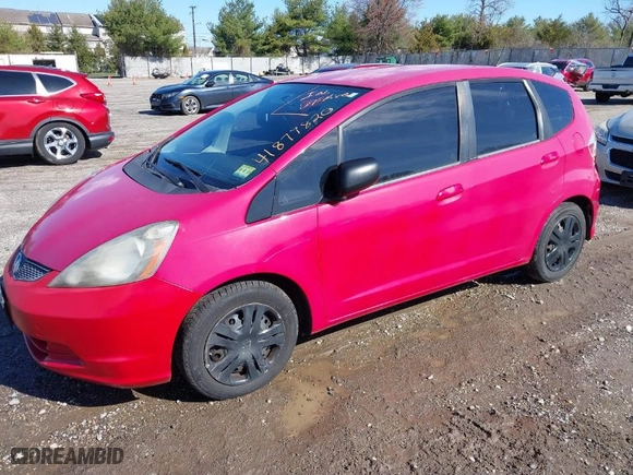 2009 Honda Fit with VIN JHMGE88219S036655, listed as a IAAI auction lot 41879820 with 209,454 mi miles. Bid and sale history available at carsss.com. Image 2.