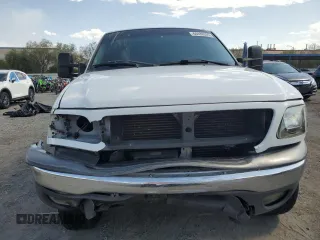 2002 Ford F-150 XL z VIN 1FTRX18L42NB40419, wystawiony jako Copart lot #60486205 z przebiegiem 241 853 mil mil oraz Szkoda całkowita • Salvage title. Historia ofert i sprzedaży dostępna na DreamBid. Obrazek 5.