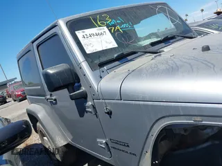 2017 Jeep Wrangler Sport with VIN 1C4GJWAG0HL621498, listed as a IAAI auction lot 42494667 with 92,284 mi miles and . Bid and sale history available at DreamBid. Image 14.