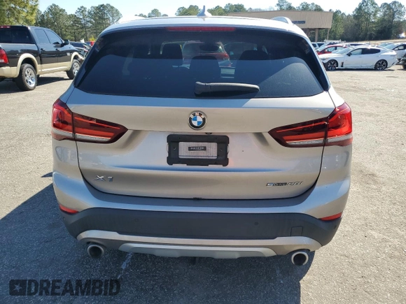 2021 BMW X1 sDrive28i with VIN WBXJG7C0XM5S33884, listed as a Copart auction lot 48413405 with 89,698 mi miles and Salvage Title. Bid and sale history available at DreamBid. Image 6.