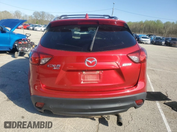 2014 Mazda CX-5 Grand Touring with VIN JM3KE4DY9E0419111, listed as a Copart auction lot 52250315 with 130,003 mi miles and Salvage Title. Bid and sale history available at DreamBid. Image 6.