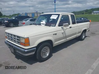 1990 Ford Ranger z VIN 1FTCR14T2LPB21654, wystawiony jako IAAI lot #42270150 z przebiegiem 92 465 mil mil oraz . Historia ofert i sprzedaży dostępna na DreamBid. Obrazek 2.