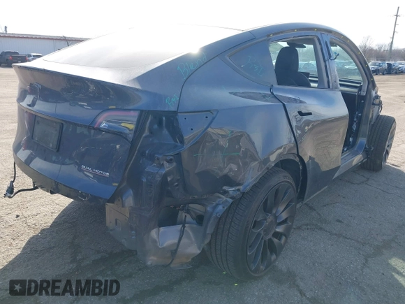 2023 Tesla Model Y Performance with VIN 7SAYGDEF7PF590750, listed as a IAAI auction lot 41694002 with Not Provided miles and . Bid and sale history available at DreamBid. Image 4.