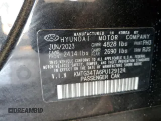 2023 Genesis G70 2.0T with VIN KMTG34TA6PU129124, listed as a Copart auction lot 58492934 with 13,407 mi miles and Clean Title. Bid and sale history available at carsss.com. Image 12.