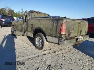 2002 Ford F-150 XL with VIN 1FTRF17W42NA89079, listed as a Copart auction lot 76519634 with Not Provided miles and Salvage Title. Bid and sale history available at carsss.com. Image 2.