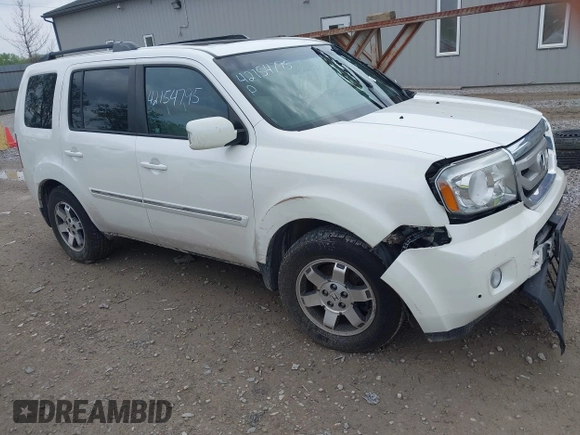 2011 Honda Pilot Touring z VIN 5FNYF4H96BB106873, wystawiony jako IAAI lot #42154795 z przebiegiem 162 282 mil mil oraz . Historia ofert i sprzedaży dostępna na DreamBid. Obrazek 1.