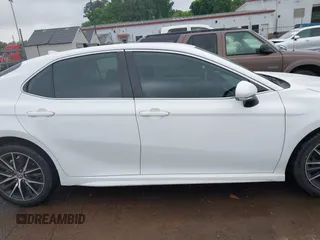 2023 Toyota Camry SE z VIN 4T1G11AK4PU738724, wystawiony jako IAAI lot #42123044 z przebiegiem 58 659 mil mil oraz . Historia ofert i sprzedaży dostępna na DreamBid. Obrazek 13.