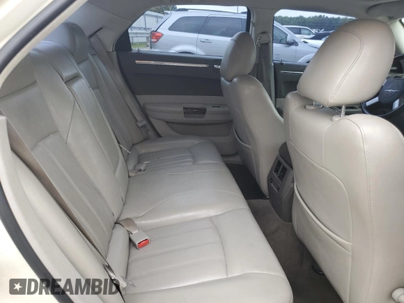 2009 Chrysler 300 C Hemi z VIN 2C3KA63TX9H619703, wystawiony jako Copart lot #60902075 z przebiegiem 140 003 mil mil oraz Szkoda całkowita • Salvage title. Historia ofert i sprzedaży dostępna na DreamBid. Obrazek 10.