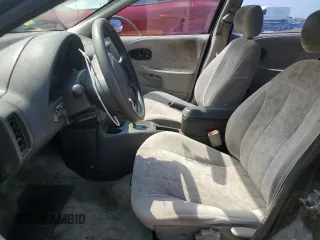 1999 Saturn SW z VIN 1G8ZK8279XZ197938, wystawiony jako Copart lot #68818514 z przebiegiem Nie podano mil oraz Tytuł czysty. Historia ofert i sprzedaży dostępna na DreamBid. Obrazek 7.