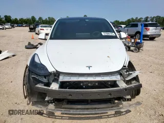 2024 Tesla Model Y Long Range с VIN 7SAYGDEE5RA261374, выставлен на аукционе Copart как лот 57666185 с пробегом 30 174 миль миль и Списание • Salvage title. История ставок и продаж доступна на DreamBid. Изображение 5.