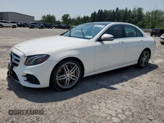 2017 Mercedes-Benz E 300 Luxury with VIN WDDZF4KB2HA061308, listed as a Copart auction lot 60214295 with 97,317 mi miles and Salvage title. Bid and sale history available at DreamBid. Image 1.