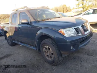 2014 Nissan Frontier SV with VIN 1N6AD0EV1EN745909, listed as a IAAI auction lot 41369850 with 202,611 mi miles and . Bid and sale history available at DreamBid. Image 1.