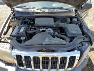 2000 Jeep Grand Cherokee Laredo z VIN 1J4GW48N9YC239166, wystawiony jako Copart lot #53321135 z przebiegiem 142 162 mil mil oraz Szkoda całkowita • Salvage title. Historia ofert i sprzedaży dostępna na DreamBid. Obrazek 12.