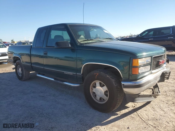 1998 GMC Sierra 1500 with VIN 1GTEC19R6WR504609, listed as a Copart auction lot 87403034 with 198,155 mi miles and Salvage Title. Bid and sale history available at carsss.com. Image 4.