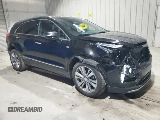 2025 Cadillac XT5 AWD Premium Luxury z VIN 1GYKNDRS0SZ119763, wystawiony jako Copart lot #57577715 z przebiegiem 10 682 mil mil oraz Tytuł czysty. Historia ofert i sprzedaży dostępna na DreamBid. Obrazek 4.