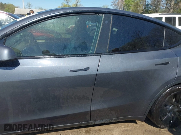 2022 Tesla Model Y Long Range z VIN 7SAYGAEE9NF574634, wystawiony jako IAAI lot #42040719 z przebiegiem 29 675 mil mil oraz . Historia ofert i sprzedaży dostępna na DreamBid. Obrazek 14.
