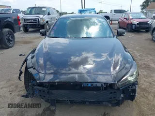 2015 Infiniti Q50 Premium z VIN JN1BV7AR8FM398319, wystawiony jako IAAI lot #42170789 z przebiegiem 86 108 mil mil oraz . Historia ofert i sprzedaży dostępna na DreamBid. Obrazek 12.