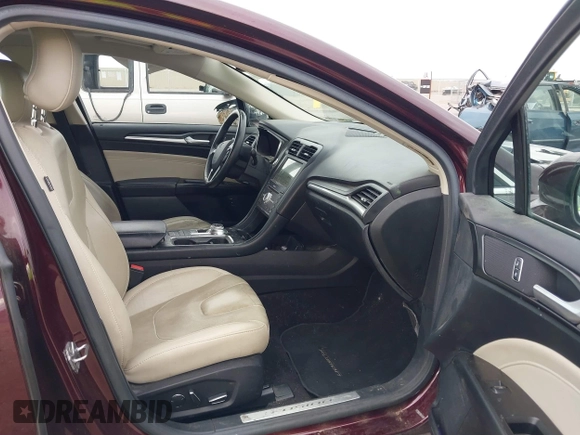 2017 Ford Fusion Titanium with VIN 3FA6P0SU3HR208641, listed as a IAAI auction lot 41732983 with 80,428 mi miles and . Bid and sale history available at DreamBid. Image 5.