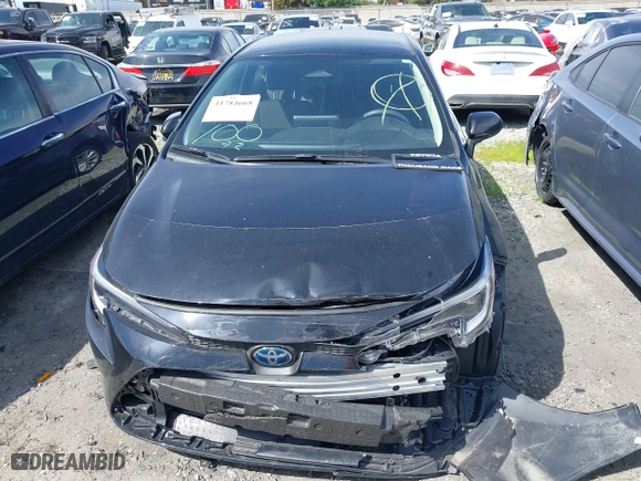 2024 Toyota Corolla Hybrid LE with VIN JTDBCMFE7R3054126, listed as a IAAI auction lot 41784668 with 15,864 mi miles. Bid and sale history available at carsss.com. Image 12.