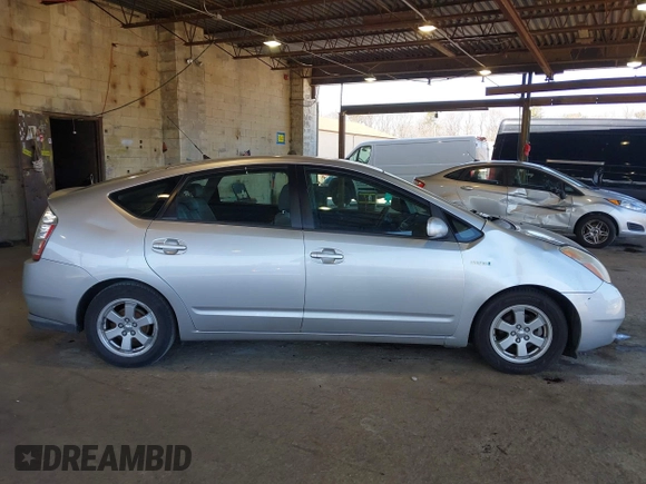 2009 Toyota Prius with VIN JTDKB20U293472505, listed as a IAAI auction lot 41988240 with 147,021 mi miles. Bid and sale history available at carsss.com. Image 13.