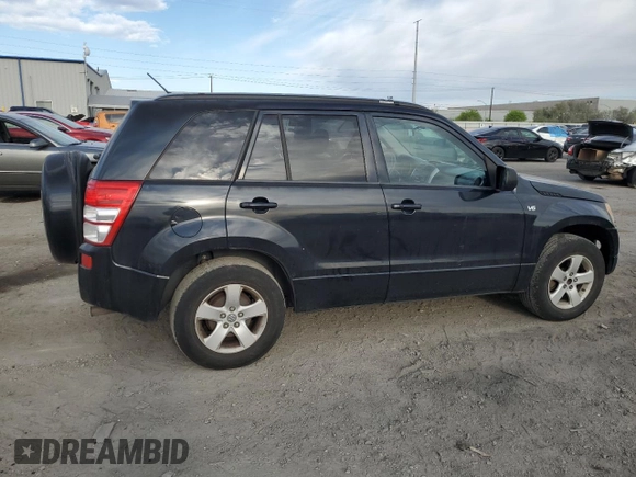 2007 Suzuki Grand Vitara XSport with VIN JS3TD944974201645, listed as a Copart auction lot 52810205 with 254,761 mi miles and Salvage title. Bid and sale history available at DreamBid. Image 3.