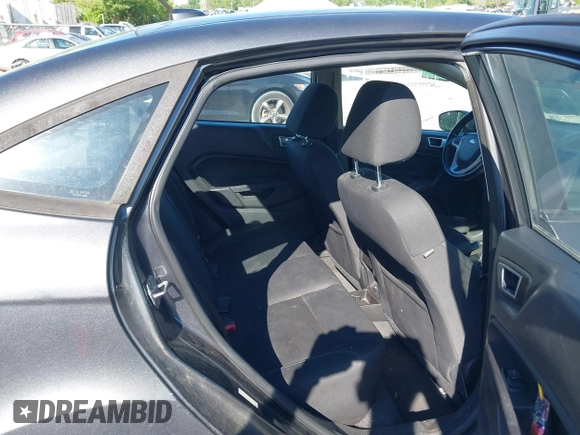 2015 Ford Fiesta SE z VIN 3FADP4BJ7FM158471, wystawiony jako IAAI lot #42090819 z przebiegiem 139 779 mil mil oraz . Historia ofert i sprzedaży dostępna na DreamBid. Obrazek 8.