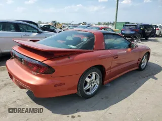 2002 Pontiac Firebird Formula z VIN 2G2FV22G822142457, wystawiony jako Copart lot #68560164 z przebiegiem 134 506 mil mil oraz Szkoda całkowita • Salvage title. Historia ofert i sprzedaży dostępna na DreamBid. Obrazek 3.