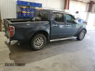 2014 Nissan Frontier SV with VIN 1N6AD0ER1EN770604, listed as a Copart auction lot 52885885 with 130,971 mi miles and Salvage Title. Bid and sale history available at DreamBid. Image 3.