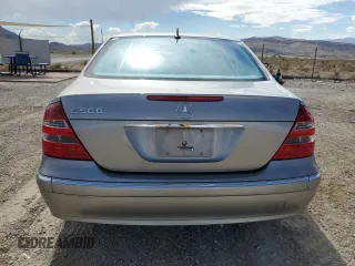 2004 Mercedes-Benz E-Class 5.0L with VIN WDBUF70J54A496963, listed as a Copart auction lot 64214634 with 113,575 mi miles and Salvage Title. Bid and sale history available at carsss.com. Image 6.